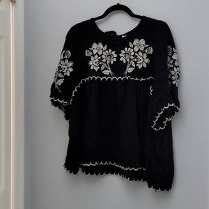 Stitched floral design black and white blouse
